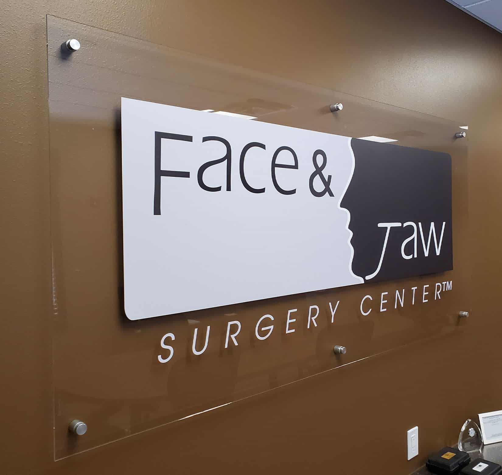 An interior office sign for Face and Jaw Surgery Center