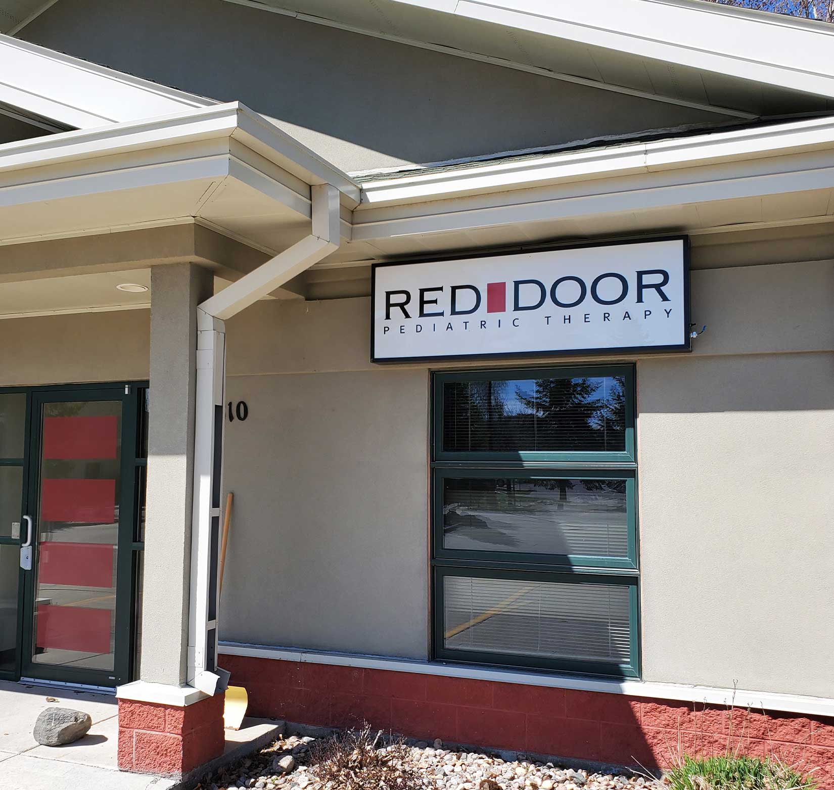 Exterior signage for Red Door Pediatric Therapy