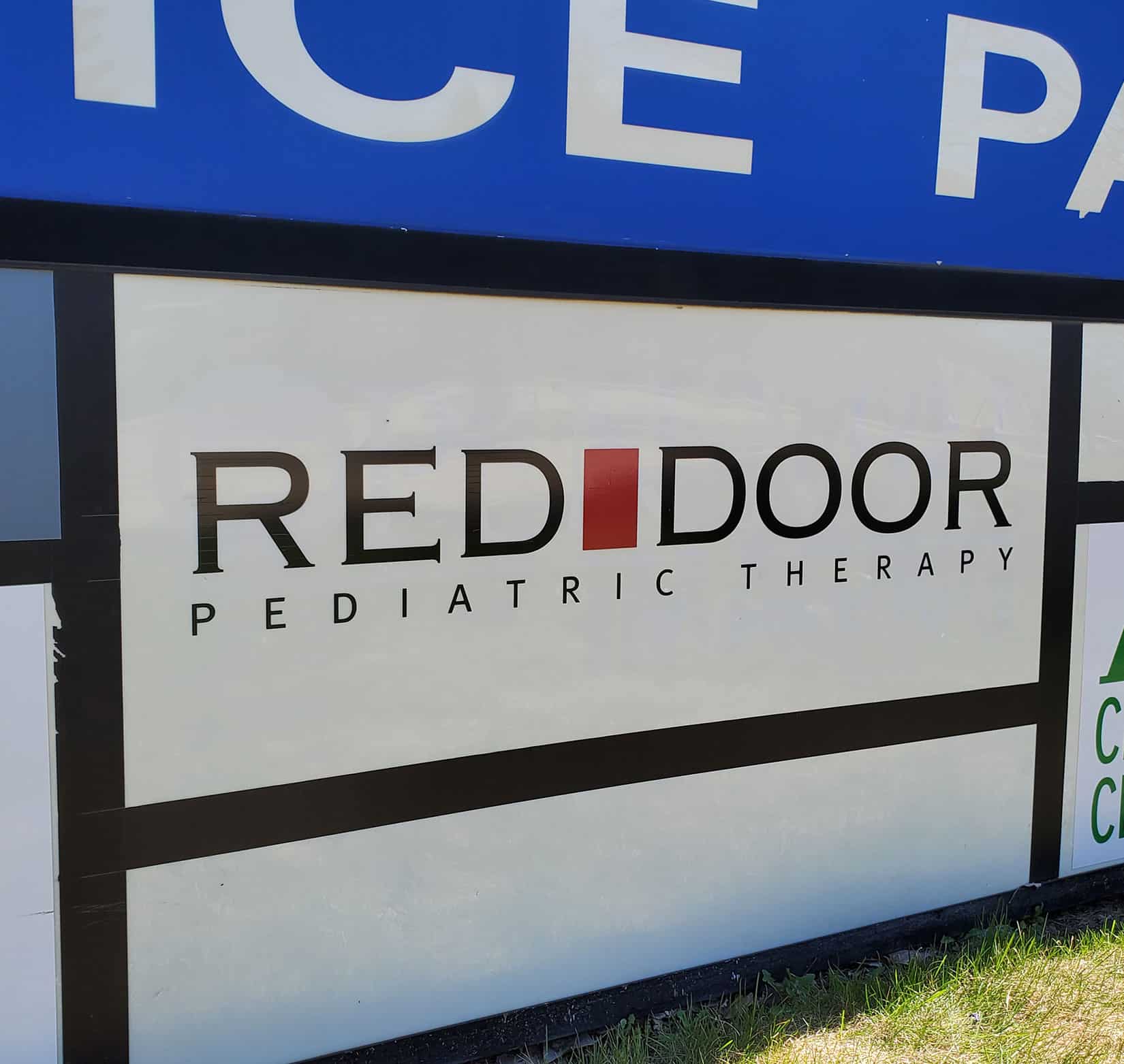 An exterior monument sign for Red Door Pediatric Therapy