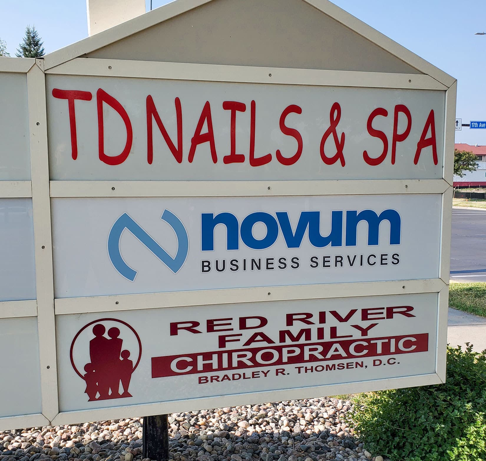 Exterior signage of Novum Business Solutions’ logo on a monument sign