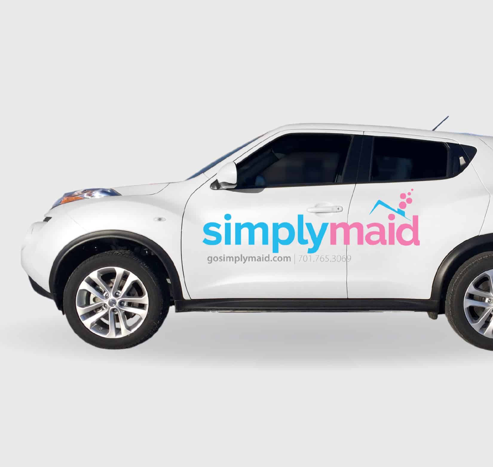 A vinyl vehicle wrap for SimplyMaid on a white SUV